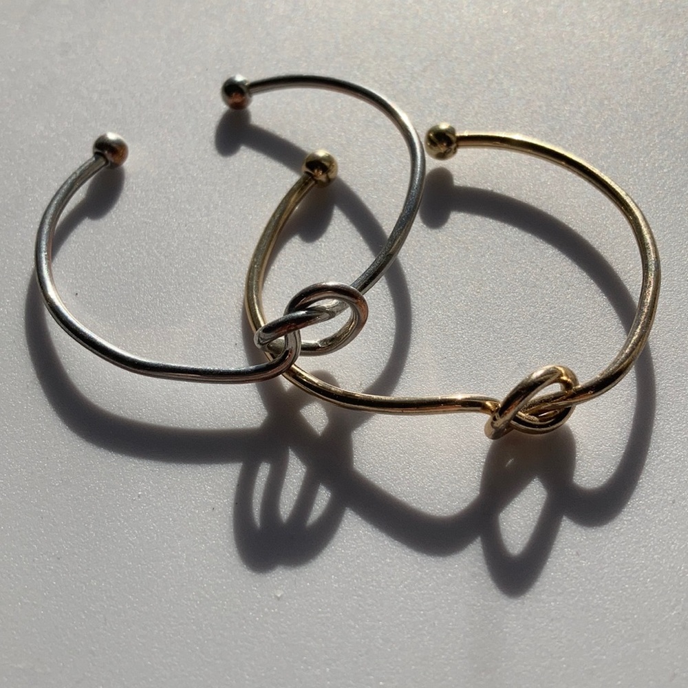 2 Forever 21 gold and silver knot bracelets